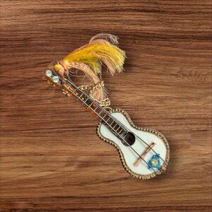 Miniature Ornate Guitar Shaped Brooch Or Keychain With Tassel Accents